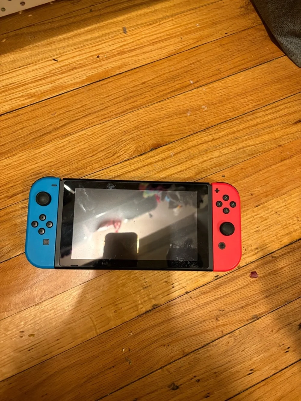Nintendo Switch with Blue Left and Red Right Joy‑Con